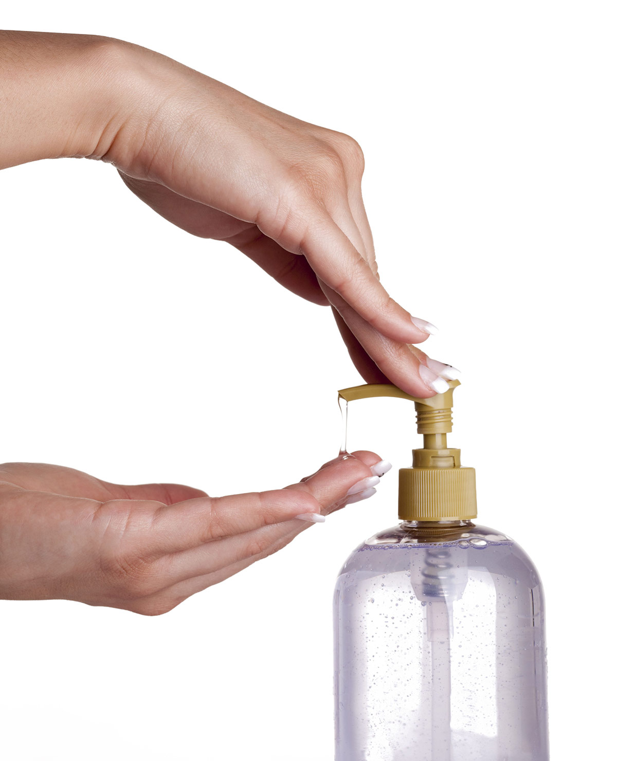 hands pumping lotion from a pump dispenser bottle