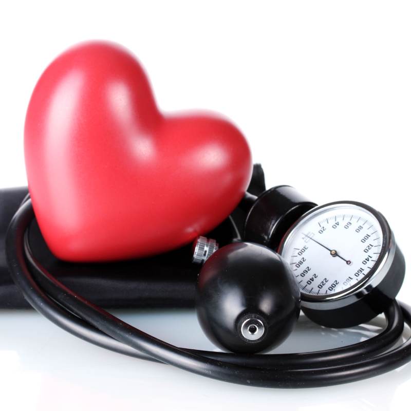 Blood Pressure measuring machine with heart shape toy kept on it